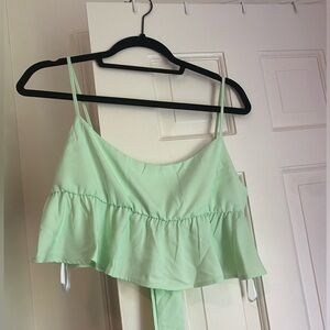 Silk green revolve top